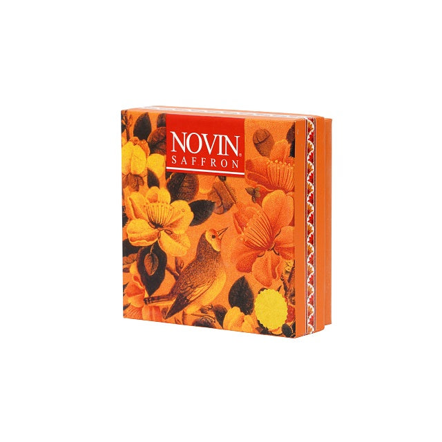 Novin Saffron packaging with floral and bird design on a white background