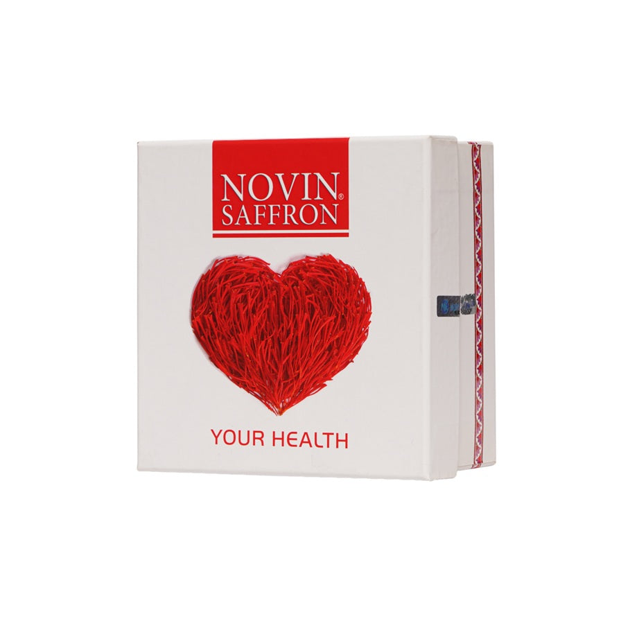 Novin Saffron Heart Series gift box – AA1 saffron in luxury white heart-themed packaging, angled side perspective
