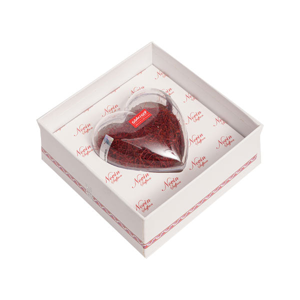 Novin Saffron Heart Series front view – luxury white hard box with red saffron heart design, premium gift packaging for UAE market