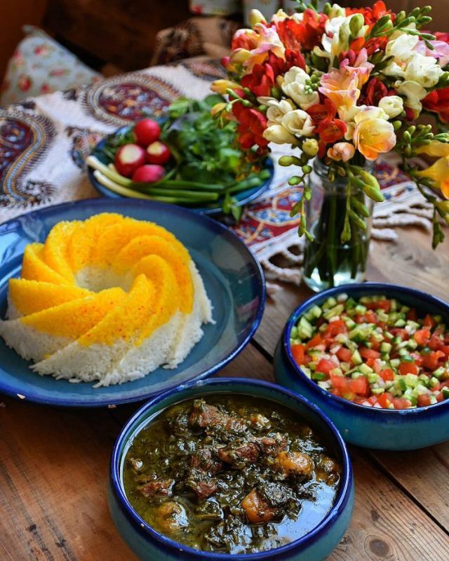 raditional Persian saffron rice and stew with fresh salad – showcasing saffron use in luxury Middle Eastern cuisine, UAE market